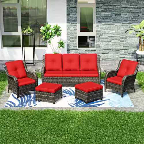 Outdoor wicker patio furniture set with red cushions