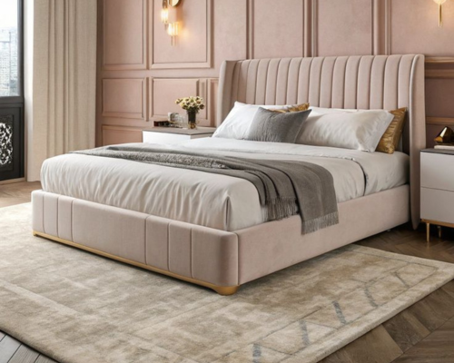 Elegant beige upholstered bed with gray throw and soft lighting in bedroom
