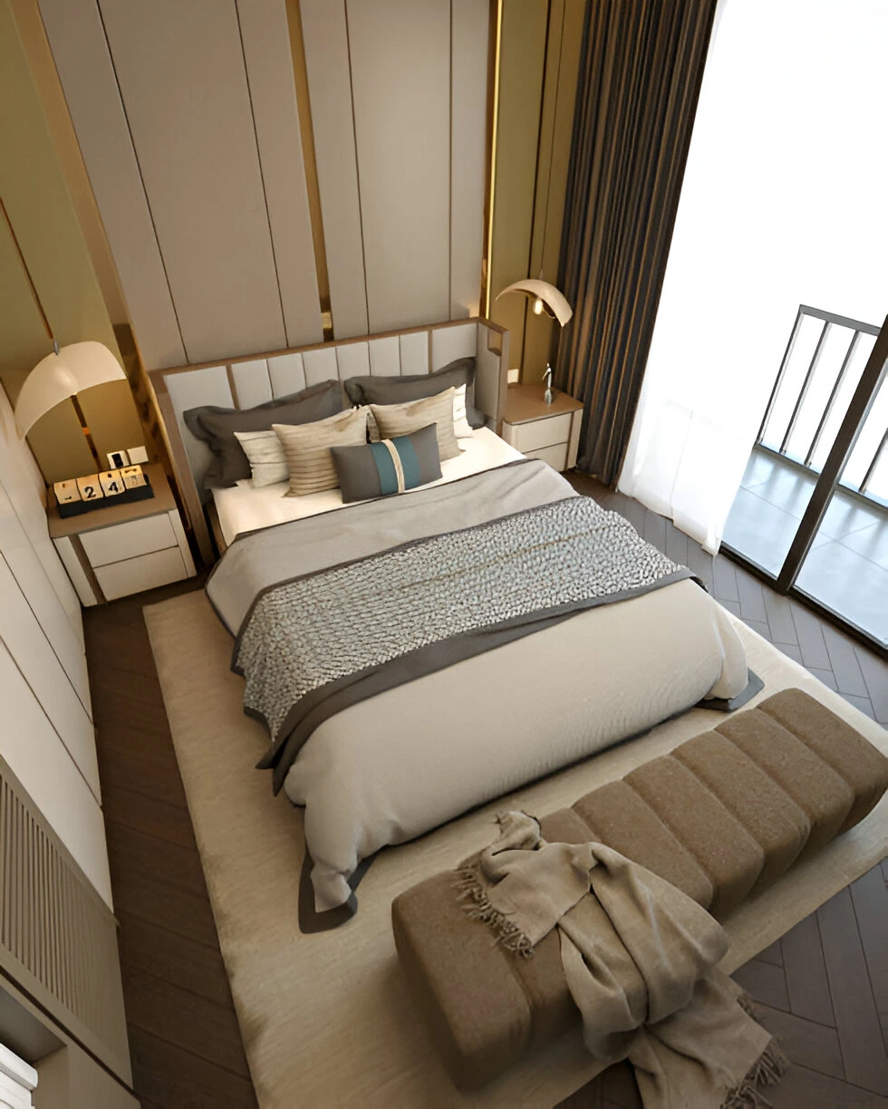 Modern bedroom with neutral tones and layered bedding