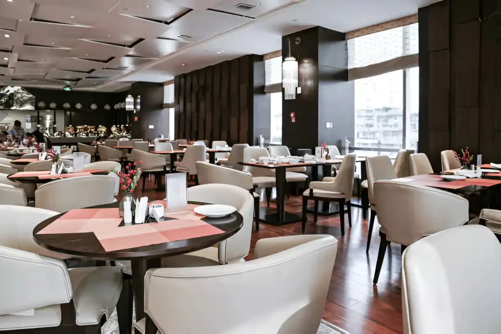 Modern fine dining restaurant with elegant seating and warm lighting