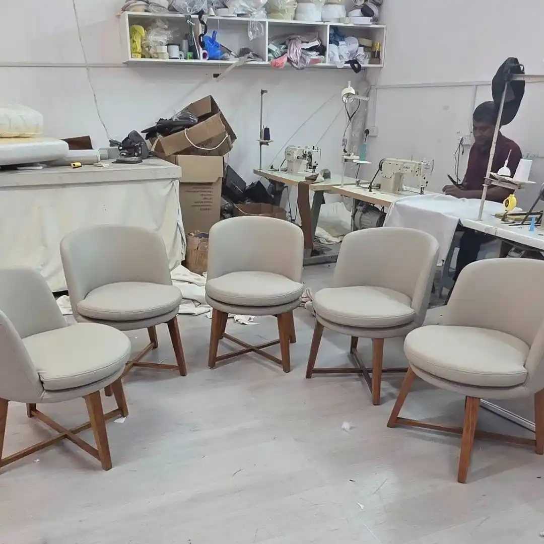 Guide explaining how to choose the right fabric for chair upholstery in Dubai based on durability, comfort, and climate suitability.